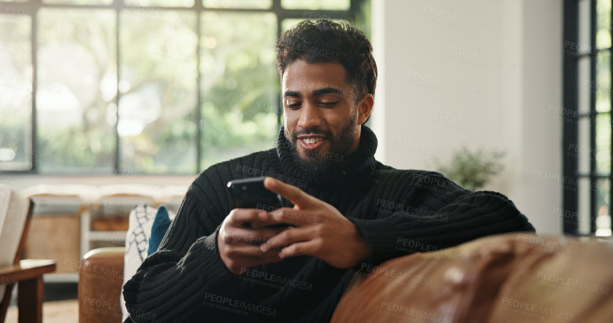 Buy stock photo Relax, cellphone and man with smile, internet and social media with communication. Home, smartphone and happy person with email notification, texting and connection with online reading or digital app