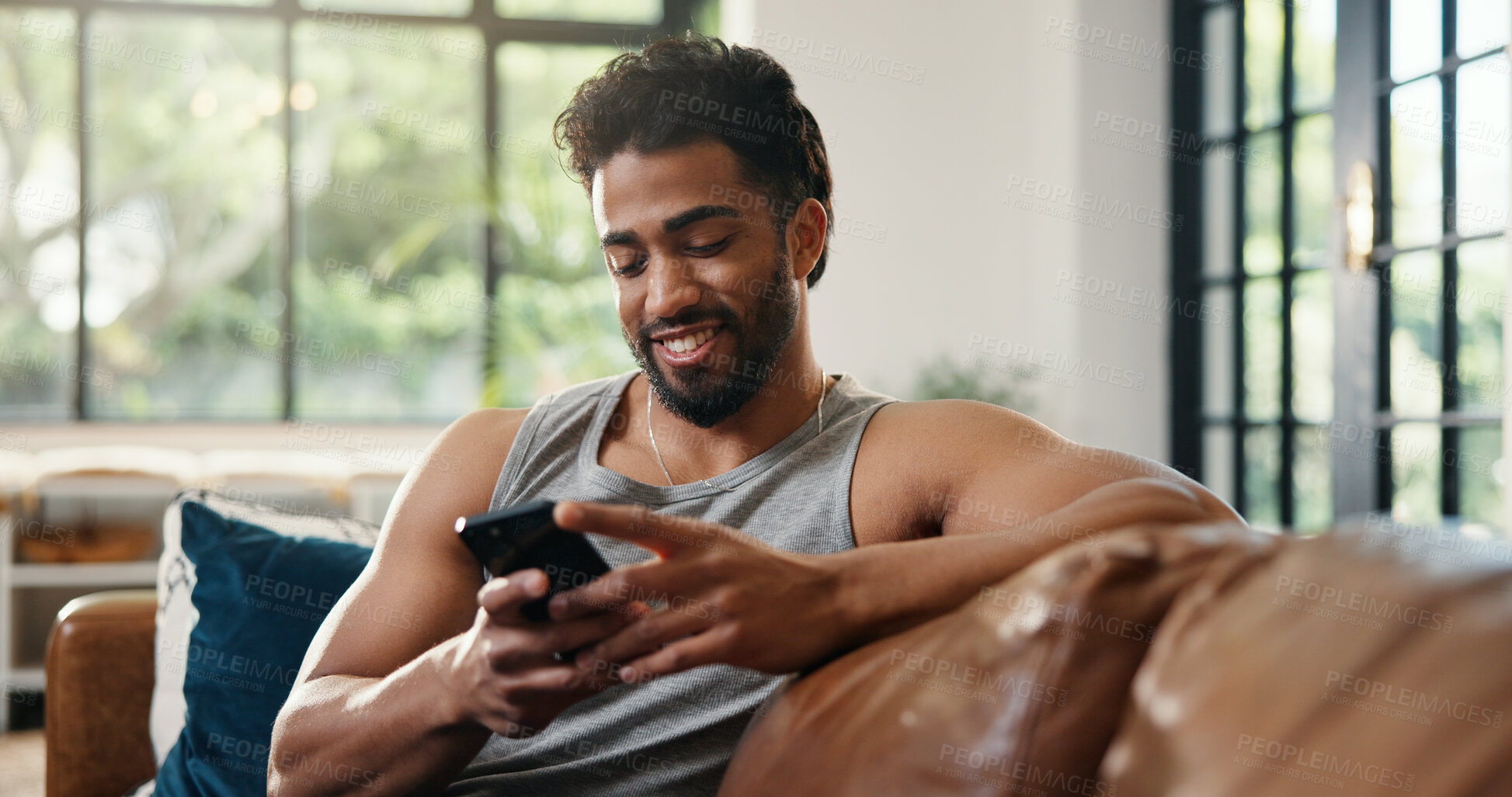 Buy stock photo Relax, reading and man with phone in lounge, check social media or browsing internet for digital book. Email notification, texting or person chilling in home with mobile app, blog post or watch video