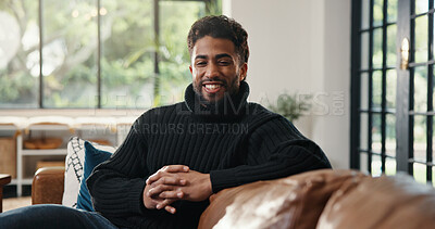 Buy stock photo Property, portrait and man on sofa with pride, fresh start and investment in dream house. Smile, real estate and male person in home with happiness, relocation or mortgage for new homeowner.