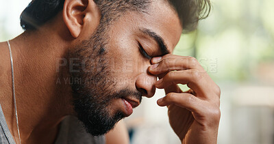 Buy stock photo Headache, frustration and man in home with fatigue, depression or mistake with financial crisis. Tired, regret and male person with migraine for mental health, pressure or burnout in apartment.