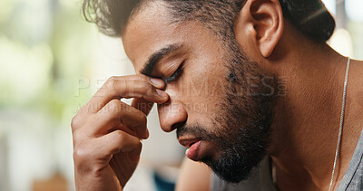 Buy stock photo Home, headache and man with pain, tired and stress with challenge, frustrated and eye strain. Apartment, migraine and person in lounge, burnout and overwhelmed with tension, fatigue and exhausted