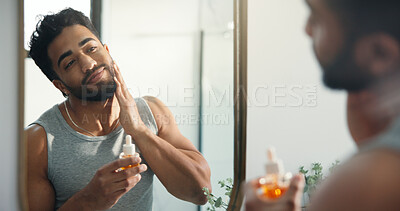 Buy stock photo Man, mirror and serum for skincare in bathroom for hydration, beard growth and self care. Male person, reflection and essential oil with collagen benefits, facial glow and hair maintenance at house