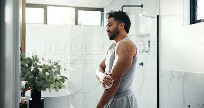 Buy stock photo Body care, exfoliation and man in bathroom for scrub skin with grooming, health and wellness. Hygiene, dermatology and male person with cloth for dry brushing for blood circulation in apartment.