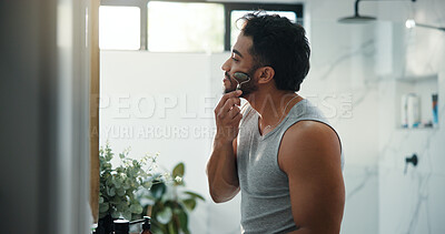 Buy stock photo Jade roller, skincare and man in bathroom for facial beauty, lymphatic drainage or circulation. Healthy skin, happy person and stone in home for massage, natural dermatology and self care in morning