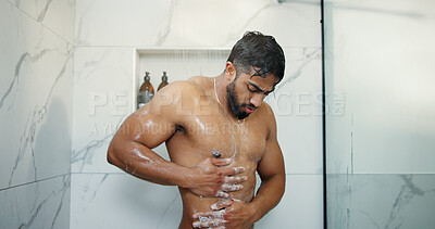 Buy stock photo Water, body wash and man in shower in bathroom for germs, dirt or bacteria removal with hygiene. Soap, dermatology and male person cleaning skin for health, wellness or morning routine in home.