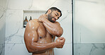 Water, soap and man in shower in bathroom for germs, dirt or bacteria removal with body care. Grooming, dermatology and male person washing skin for health, wellness or morning routine in home.