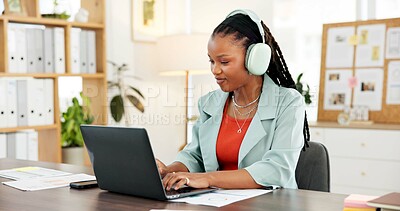 Buy stock photo Headphones, laptop and typing with business black woman in office to review sales report statistics. Computer, data and music with African employee at desk in workplace for accounting or management