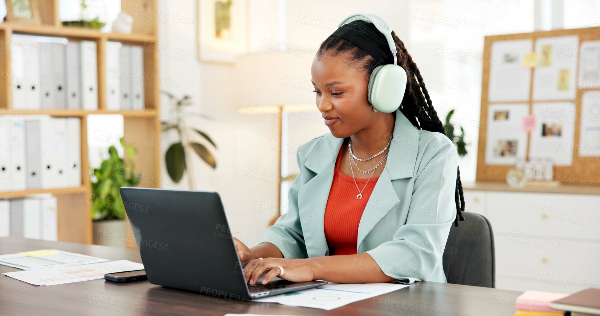Buy stock photo Headphones, laptop and typing with business black woman in office to review sales report statistics. Computer, data and music with African employee at desk in workplace for accounting or management