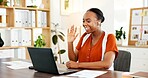 Woman, wave and video call in office with laptop for virtual conference, finance chat or discussion. Happy, black person or earphones with computer for online meeting, financial feedback or greeting.