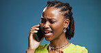 Black woman, argument and stress with phone call in studio for disagreement on a blue background. Frustrated, female person or model shouting with mobile smartphone for fight, dispute or issue