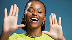 Portrait, frame and woman with selfie in studio, profile picture and post on social media and online. Blue background, happy and black person with image on web, capture and photography for memory