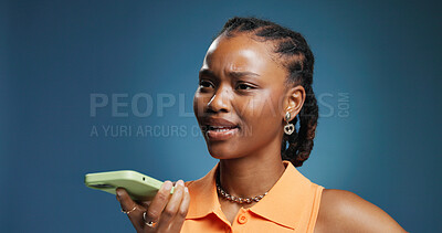 Buy stock photo Explain, phone call and thinking with black woman in studio for communication, feedback or solution. Conversation, idea and voice with unsure African person on blue background for mobile update