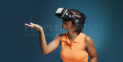 Buy stock photo Gaming, metaverse and vr headset for black woman in studio for immersive experience. Interface, simulation and virtual reality with African user on blue background for cyberspace interaction or space