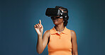 Interface, metaverse and vr headset for black woman in studio for immersive experience. Gaming, simulation and virtual reality with African user on blue background for cyberspace interaction or space