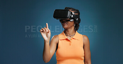 Buy stock photo Interface, metaverse and vr headset for black woman in studio for immersive experience. Gaming, simulation and virtual reality with African user on blue background for cyberspace interaction or space