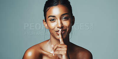 Buy stock photo Skincare, portrait or happy woman with quiet gesture in studio, healthy glow or natural shine for wellness. Silence pose, dermatology secret or person with beauty surprise, space or green background