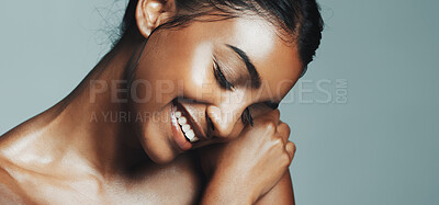 Buy stock photo Smile, woman and relax for skincare in studio with beauty, healthy skin and natural shine. Happy, female person and cosmetics with facial glow, collagen treatment and dermatology on gray background