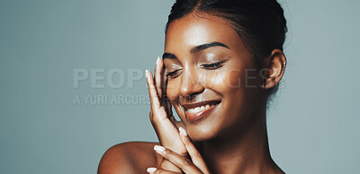 Buy stock photo Happy, woman and beauty for skincare in studio with healthy skin, self care or natural shine. Mockup space, person and cosmetics for facial glow, collagen treatment and dermatology on gray background