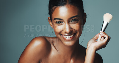 Buy stock photo Beauty portrait, girl and makeup brush on studio background for powder, contour or skin glow. Cosmetology, woman and smile with cosmetics tool on mockup space for foundation application and aesthetic