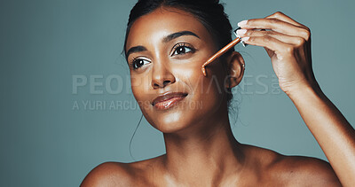 Buy stock photo Beauty, makeup or woman with foundation dropper in studio, application or facial product for aesthetic. Even skin tone, space or happy person with natural cosmetic for glow, shine or green background