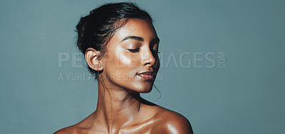 Buy stock photo Beauty, mockup and relax with Indian woman in studio for cosmetics or dermatology satisfaction. Aesthetic, skincare and wellness with model isolated on gray background space for cosmetology benefits