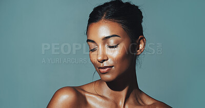Buy stock photo Relax, skincare and space with Indian woman on mockup for cosmetics or dermatology satisfaction. Aesthetic, beauty and wellness with model isolated on studio background for cosmetology benefits