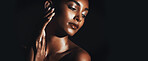 Skincare, space and Indian woman on dark background with touch, natural glow or smooth texture with shimmer. Beauty, shine and girl in studio with softness, mockup and radiant skin in body care.