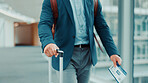 Person, hands or travel with suitcase in airport for business journey, work trip or commute. Ticket, employee or traveler with luggage or international boarding pass for departure or job opportunity