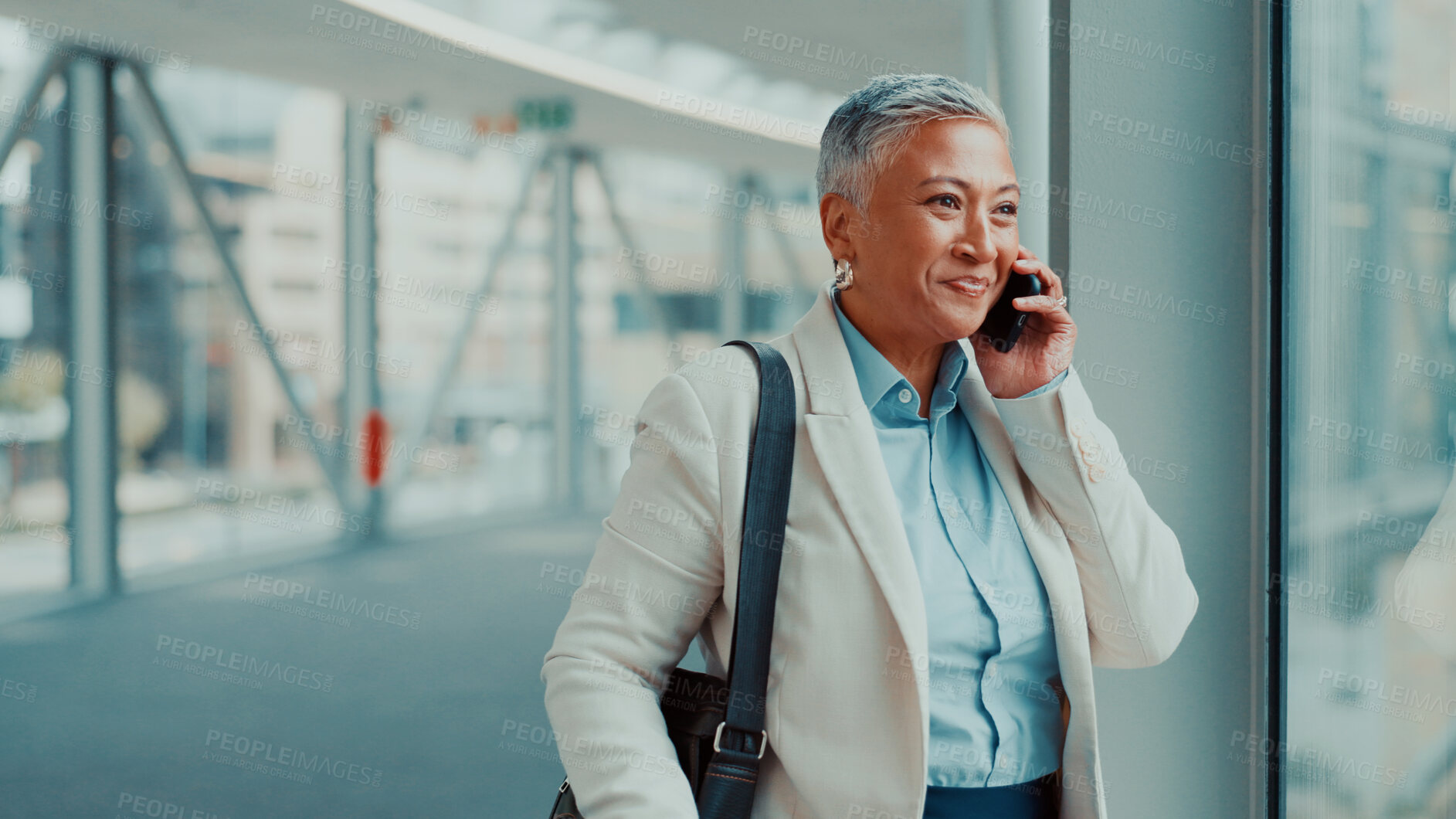 Buy stock photo Airport, phone call and businesswoman with smile, travel and discussion for flight schedule or chat. Happy, employee and mature person with mobile for trip update, talking and meeting confirmation
