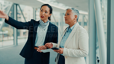 Buy stock photo Woman, worker and help with pointing at airport for terminal directions, work trip or boarding flight. Corporate travel, gate agent and mature person with air ticket for departure or customer service