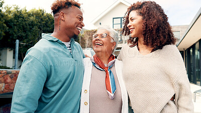 Buy stock photo Happy, laugh and people with senior woman for hug, bonding or family time together outdoor. Smile, connection and adult children embracing elderly mom in backyard for pride, care and retirement.