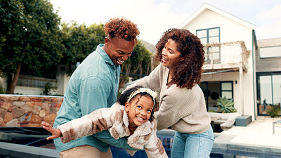 Buy stock photo Laughing, parents and playing with child, outdoor and happiness with daughter, bonding and together. Backyard, man and woman with girl at home, people and fun with family, game or dad with smile