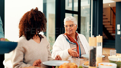 Buy stock photo Family dinner, senior woman and talking in home for social gathering, holiday celebration or support. Love, people and old person with lunch party at dining table for festive reunion, bonding or chat