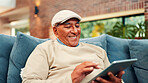 Tablet, happy and senior man on sofa in home with networking, social media or blog post. Relax, digital technology and elderly male person in living room for reading news headline on app in house.
