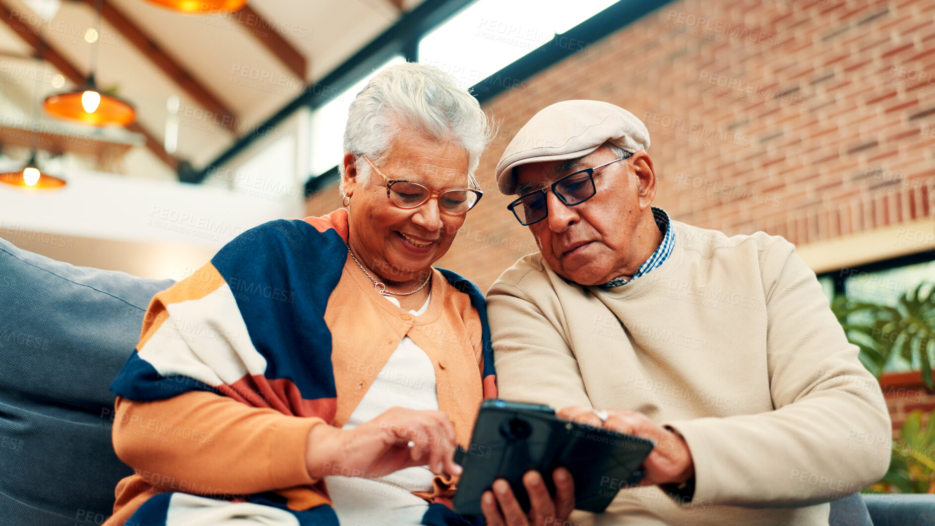 Buy stock photo Sofa, happy and senior couple with phone for online connection, internet and networking. Retirement home, low angle and old man and woman on smartphone for website, bonding and relax together