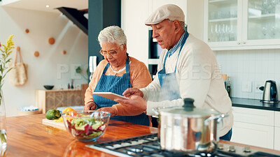 Buy stock photo Tablet, old couple and cooking in kitchen for online tutorial, video or food blog with bonding in home. Man, woman and tech with recipe on website, meal prep or healthy snack in retirement together