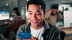 Media agency, night and happy man in office, cellphone and funny meme with communication. Person, evening or journalist in workspace, smartphone or email for online review or digital app for chatting
