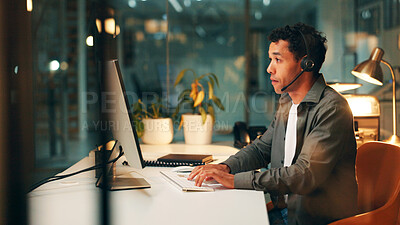 Buy stock photo Night, call center and man in office, computer and customer support with system solution. Late, person and employee in workplace, pc and consultation with help desk, crm and contact us with internet