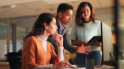 Buy stock photo Computer, discussion and business people in office at night with creative project in collaboration. Review, technology and manager with magazine editors for advice on article for publishing deadline.