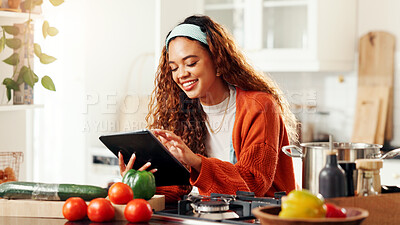 Buy stock photo Happy, woman and cooking with tablet in kitchen, vegetables and research for recipe and instructions. Home, scroll and person with tech for meal prep, ingredients and planning for dinner on website
