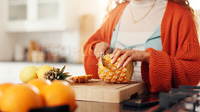 Buy stock photo Hands, cutting and woman in kitchen, pineapple and nutrition with healthy snack. Home, knife and person with sharp utensil, wellness and diet meal with organic ingredients, chopping board and fruit