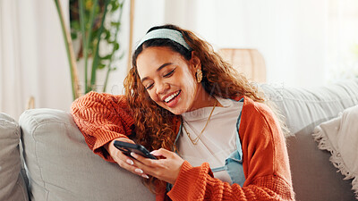 Buy stock photo Woman, laugh and texting with smartphone, lounge and communication with contact on social media app. Typing, message and person with mobile for chat, online and browsing on website, break and home