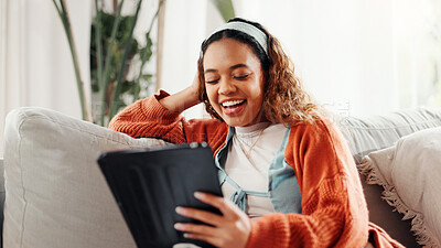 Buy stock photo Tablet, relax and laugh with woman on sofa for social media, streaming online video and post comment. Meme, communication app and digital chat platform with person in living room of home for search