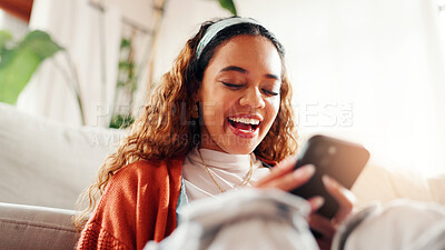 Buy stock photo Woman, relax and laugh with phone in home for social media, reading meme and funny video. Smile, female person and mobile app for browsing website, streaming comedy and online joke for entertainment