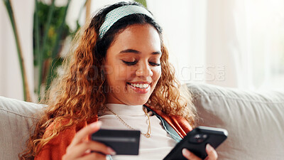 Buy stock photo Credit card, phone and smile with student on sofa for online shopping, ecommerce and loan. Digital payment, banking website and woman in living room of home for fintech, transaction or subscription
