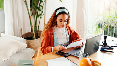 Buy stock photo Reading, paper or university student in house with laptop, e learning or research for online project. College, tech or woman in home with document, test preparation or draft review for virtual course