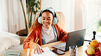 Headphones, laptop and businesswoman in home with documents for creative project with music. Happy, freelancer and magazine editor in house with paperwork, audio tech and computer for publishing.
