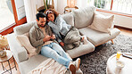 Couple, relax and talking on sofa with phone for social media, online communication or connection. Above, married people rest and tech in home for browsing internet, bonding together or conversation.