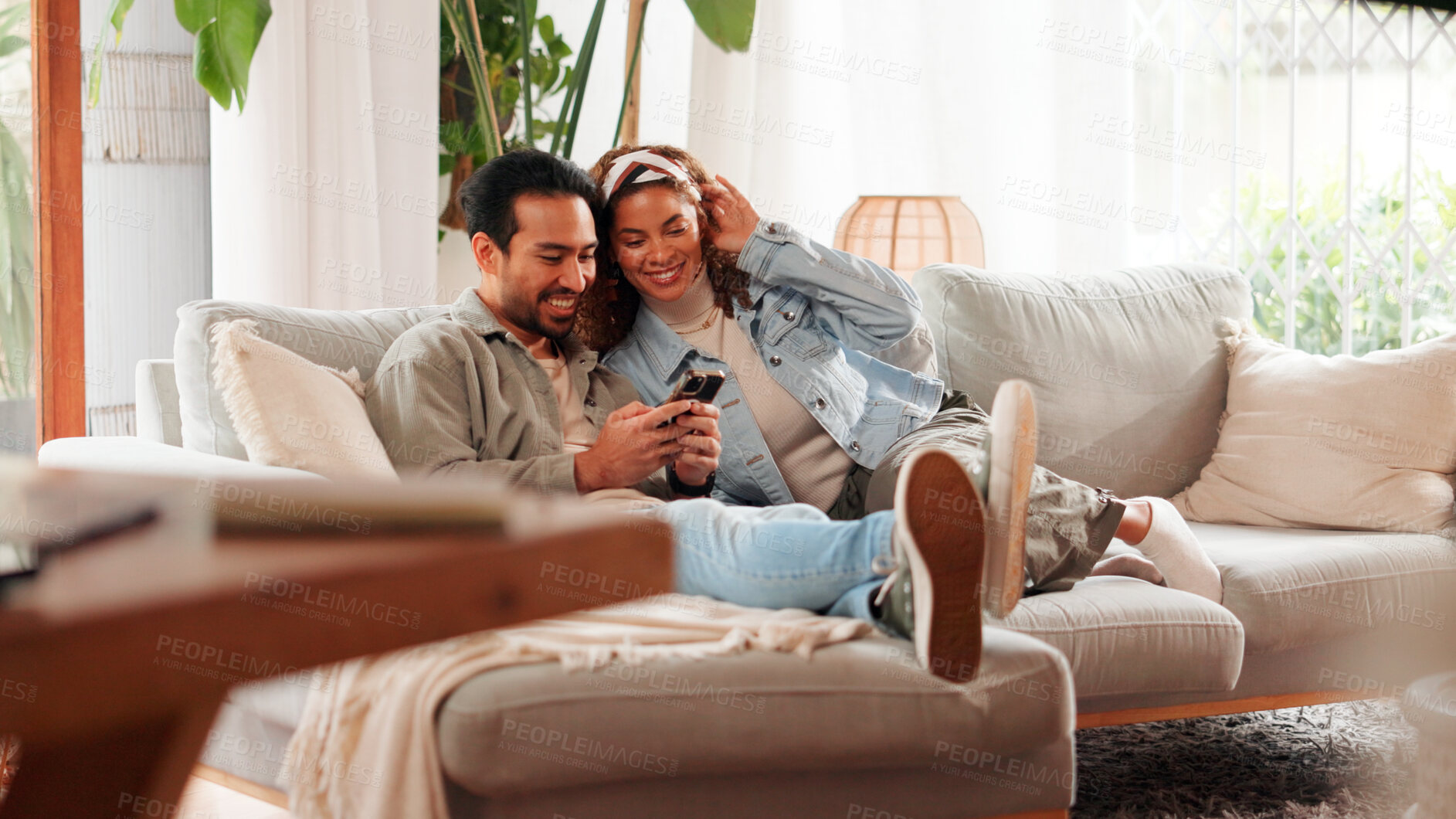 Buy stock photo Couple, relax or scroll on couch with phone for social media, online communication or connection. Happy, married people rest and tech in home for browsing internet, bonding together and conversation.