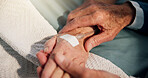 Hospital, holding hands and mature people in bed for recovery from surgery, healing and support. Healthcare, medical and closeup of couple together for comforting, empathy and wellness for operation